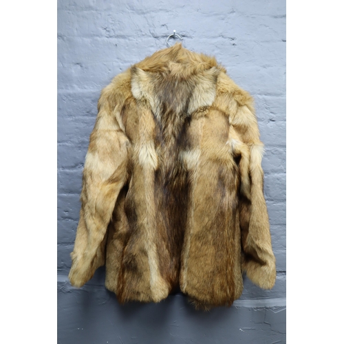 712 - A job lot of 4 mid century of real fur coats, two short and two long, one real sheep skin