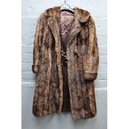 712 - A job lot of 4 mid century of real fur coats, two short and two long, one real sheep skin