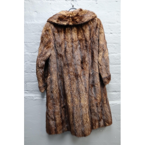 712 - A job lot of 4 mid century of real fur coats, two short and two long, one real sheep skin