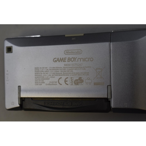 448 - Nintendo Game boy micro with 3 games including: Advance wars 2 black hole rising, Castlevania and Ad... 