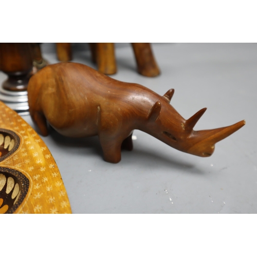 888 - A Selection of Wooden Items To Include Pair of Tribal Candleholders, Hand Carved Elephant, Tribal Fi... 