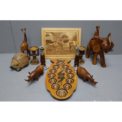 888 - A Selection of Wooden Items To Include Pair of Tribal Candleholders, Hand Carved Elephant, Tribal Fi... 