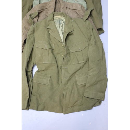 897 - Authentic British Army surplus to include, shirts, hats/caps, jackets & a water caddy (8 jackets... 