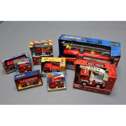 854 - Collection of Eight Boxed Firetruck Toys, All Appear Unused