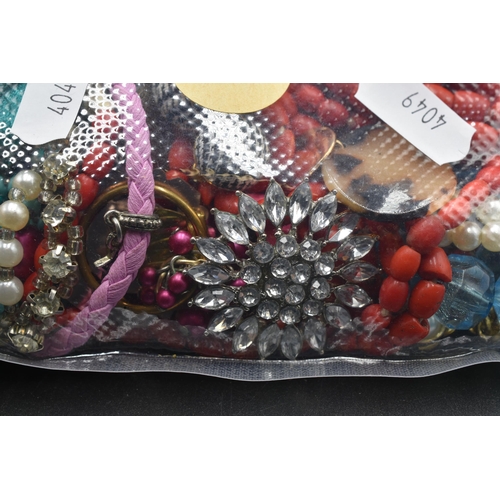 488 - A sealed bag full of unsorted jewellery