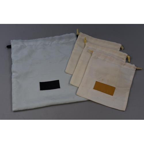 486 - Four Radley Dust Cover Bags