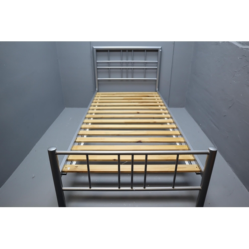 702 - Metal bed frame (single) with wooden slats (good condition)