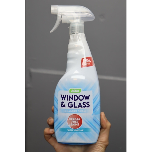 898 - Big box of cleaning goods to include: window and glass cleaner, stain and odor remover and more