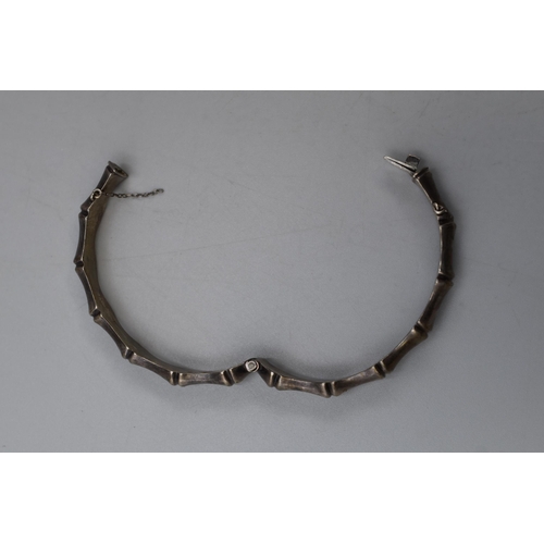 28 - A Hallmarked Birmingham Silver Bangle, Circa 1961. Safety Chain is AF