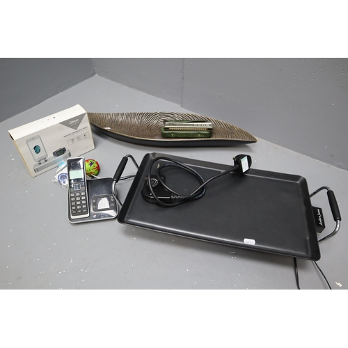 649 - Selection of items to include BT Zenon phone and base, Harmonica, retractable lanyards, hot plate, a... 