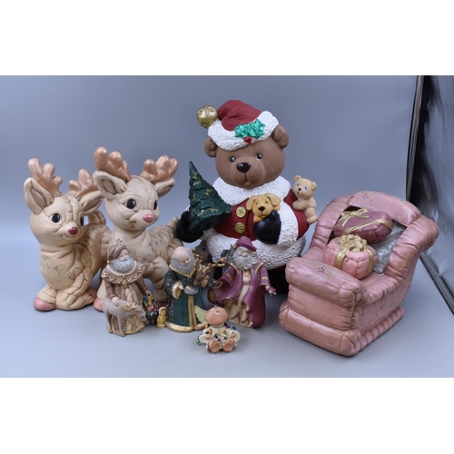 812 - A Selection of Christmas Decorations To Include Two Handpainted Reindeers, Bear Father Christmas, Th... 