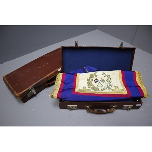 815 - Two Cases containing a selection of Masonic Regalia including Aprons, Sash's, Jewels, Paperwork and ... 