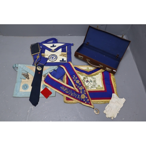 815 - Two Cases containing a selection of Masonic Regalia including Aprons, Sash's, Jewels, Paperwork and ... 