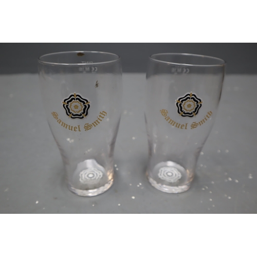 856 - A Large Selection of Mostly Branded Glassware To Include Beavertown Pint and 1/2 Pint Glasses, Capta... 