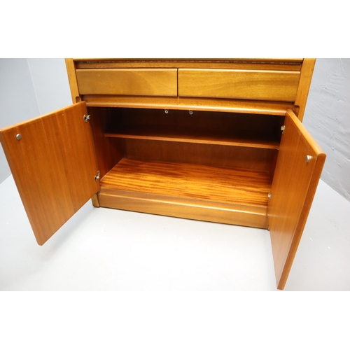 707 - Mid Century Teak Lockable Bureau With Key. Features pigeon holed top section. 2 drawers and a 2 door... 