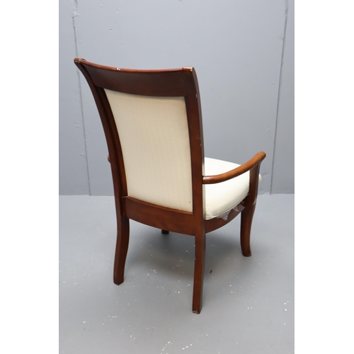 712 - Italian style upholstered arm chair in cream measures 40