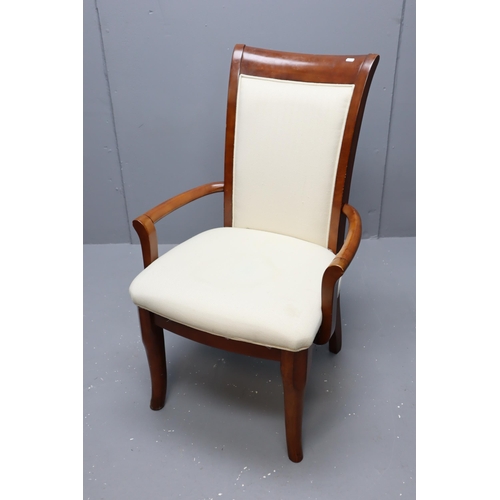 712 - Italian style upholstered arm chair in cream measures 40