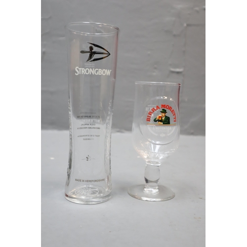 890 - A Selection of 24 2019 Strongbow Pint Glasses, With Strongbow Beer Mats, And 24 Birra Moretti 1/2 Pi... 