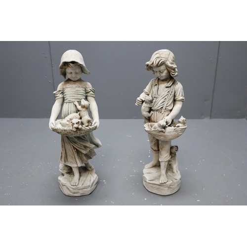 728 - Two chalk children garden figures with animals (20