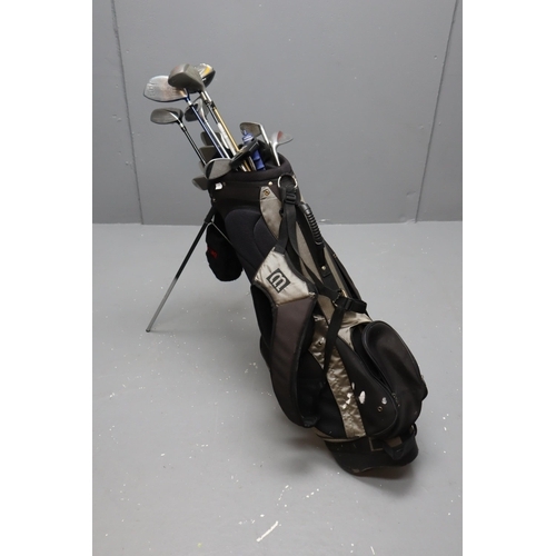 741 - Selection of Golf Clubs In Wilson Golf Bag Including Donnay Slammer II, TaylorMade R7 425 and More. ... 