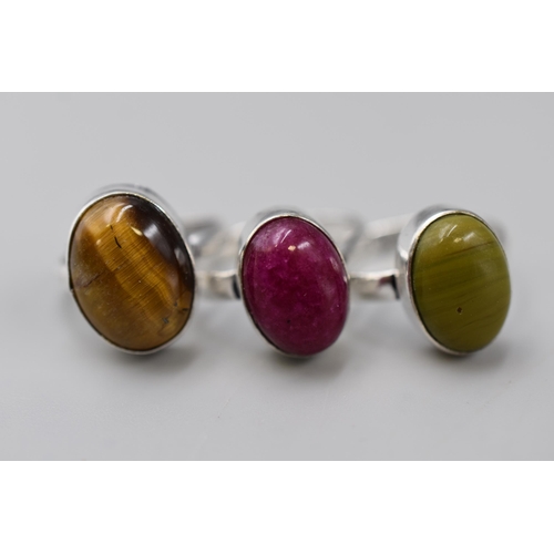 12 - 925 Silver ring Dark Ruby styled size R, Tigers Eye styled size M+5 and Moldavite styled size Q