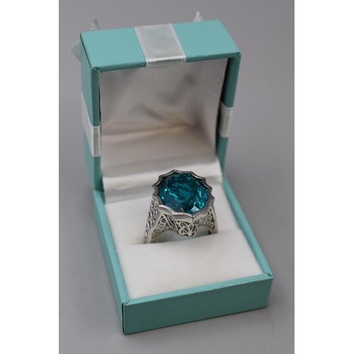 19 - Silver 925 blue stoned ring (size T)