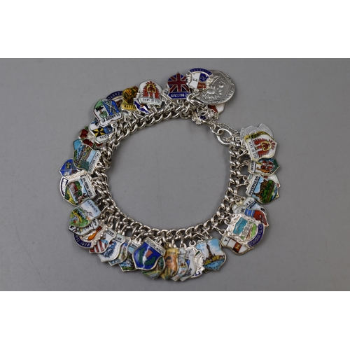 47 - Sterling Silver Bracelet with a Large Selection of Crested Charms