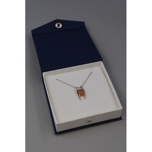 59 - Silver 925 Necklace with possibly Peach Moonstone Pendant. Complete in Presentation Box