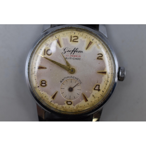 75 - A 17 Jewels Mechanical Gieffem Gents Watch, With Leather Strap. Working