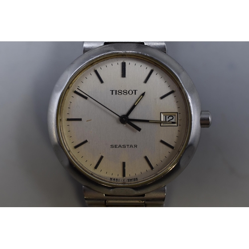 82 - A Tissot Seastar Quartz Day/Time Watch, With Original Strap. Working