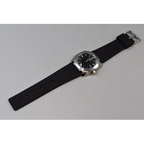 103 - An Exec Quartz Day Time Watch, With Rubberised Strap. Working