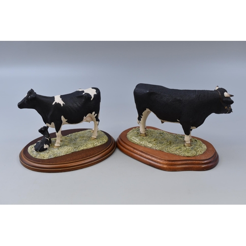 285 - Two Border Fine Arts Cow/Bull Figures on Wooden Plinths, Signed J A Butler. Tallest Approx 5