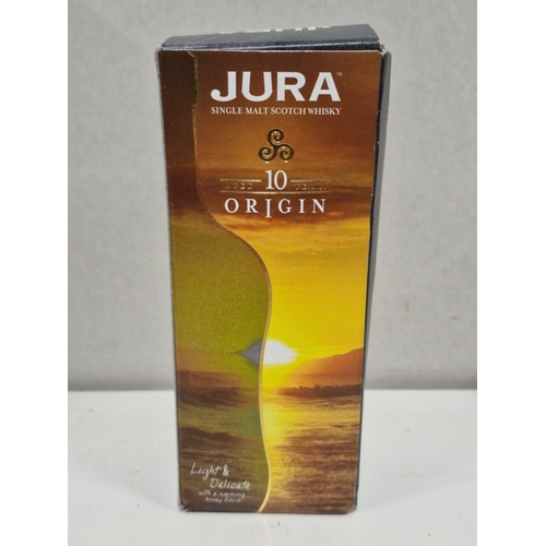 300 - JURA Single Malt Scotch Whisky Aged 10 Years Origin. Boxed. 40% VolumeThis is a Small 20cl bottle.... 