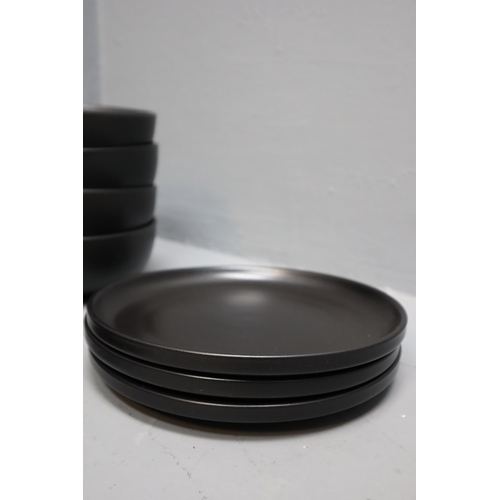 352 - An Eleven Piece Matte Black Dinner Service (Four Bowls, Four Dinner Plates, And Three Side Plates)