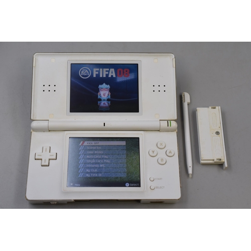 387 - Nintendo white DS Lite with charger and R4 card, Sega superstars tennis and Fia 08 (works when teste... 