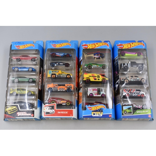 537 - Four Hot Wheels 5 packs - HW Rescue, Hot Wheels City, Speed Blur and Fast & Furious