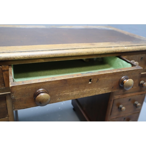 445 - Antique Oak Three Sectional Nine Drawer Small Captains Desk on Castors a nice Example of a Genuine U... 