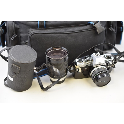 540 - Olympus OM10 35mm SLR Camera with Olympus 75-150mm Lens, Hoya 28mm to 85mm Lens, Case and a Selectio... 