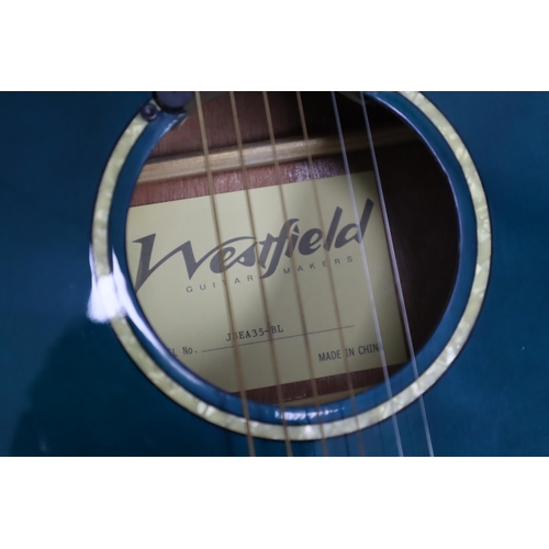 545 - A Westfield JBEA35-BL Cut-Away Electro-Acoustic Guitar With In-Built Tuner and Original Case