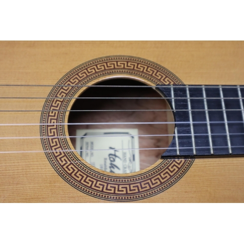 547 - A Hohner HC06E Classical Electro-Acoustic Guitar, With Shadow Pickup, Guitar Strap, And Carry Bag