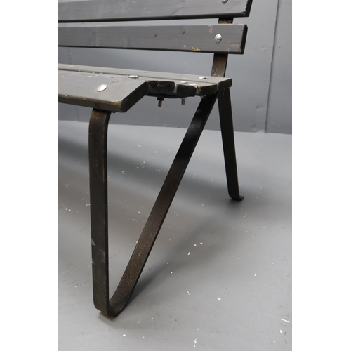 582 - A Cast Metal Framed Garden Bench With Matte Grey Wooden Slats, Approx 36