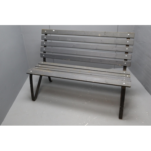 582 - A Cast Metal Framed Garden Bench With Matte Grey Wooden Slats, Approx 36