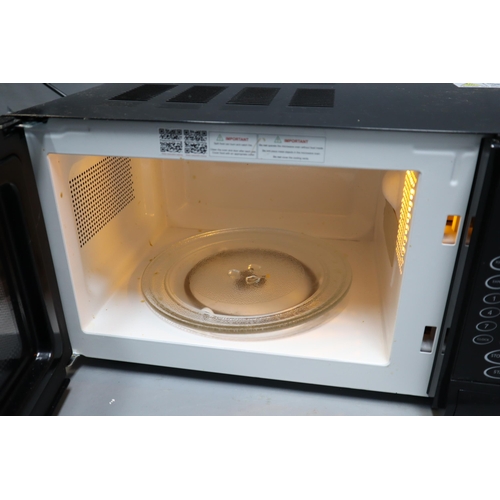 549 - Cookworks EM7 Microwave (Powers On When Tested)