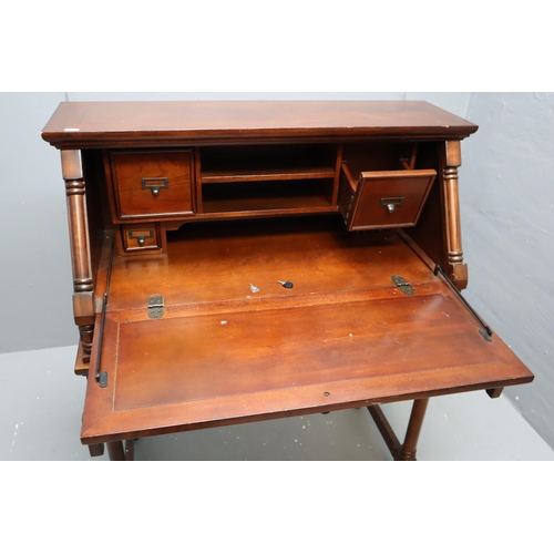 590 - Dark wood writing bureau with 4 internal and 2 external drawers measures 43