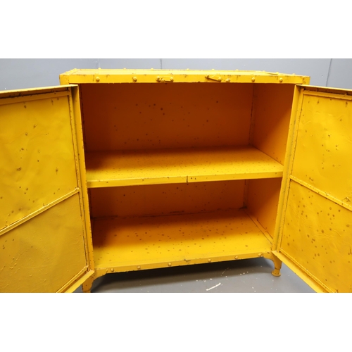 559 - An Indusrial Yellow Metal Storage Unit With Vintage Timber Branding. Approx 16