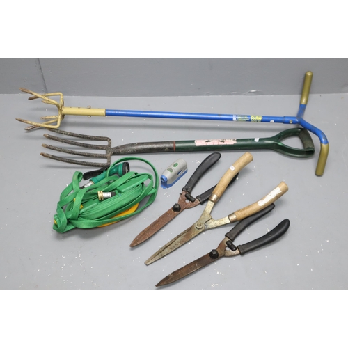 633 - A Selection of Gardening Tools To Include Fork, Garden Claw, Hose, And Three Hedge Clippers. With Sp... 