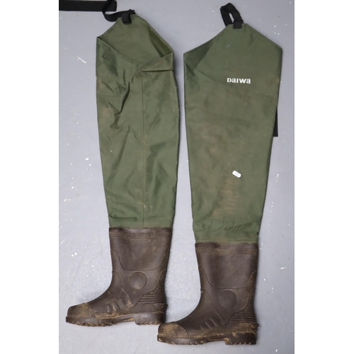 643 - Two pairs of waterproof wading boots over knee hip waders (one is size 38) and Two welly camouflage ... 