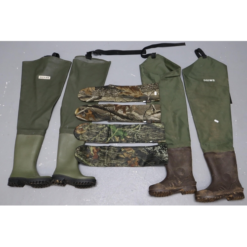 643 - Two pairs of waterproof wading boots over knee hip waders (one is size 38) and Two welly camouflage ... 