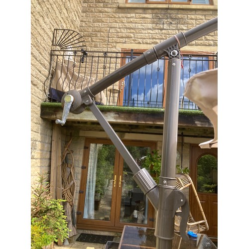 625 - Large garden cranking, cantilever, sun shade/parasol in brown and cream with solar LED lights, 8 fee... 