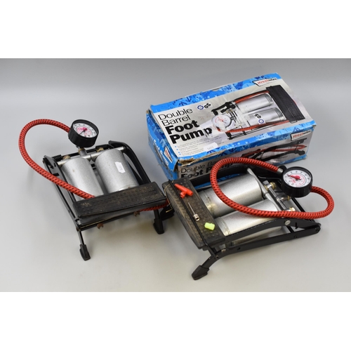 676 - Two double barrel foot pumps (one boxed)